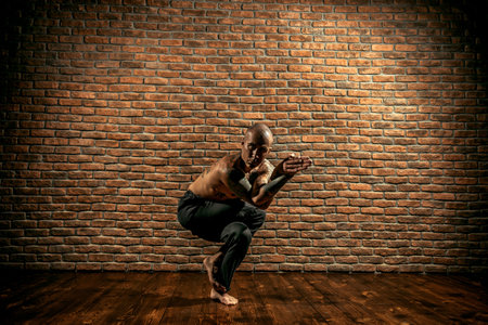 Various difficult yoga poses. Yoga teacher doing exercises on yoga.の写真素材