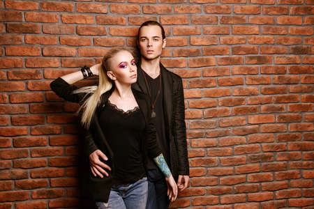 Portrait of an attractive young people in love. Beauty, fashion concept. Bright make-up, cosmetics.の写真素材