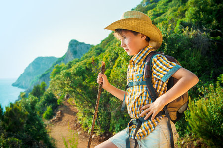 Happy boy on summer holidays. Outdoor activities, tourism and adventure.