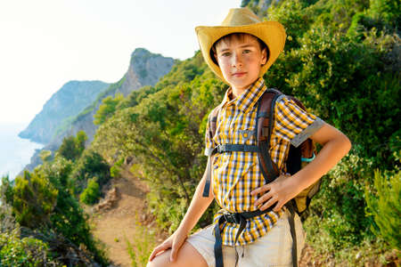 Happy boy on summer holidays. Outdoor activities, tourism and adventure.の写真素材