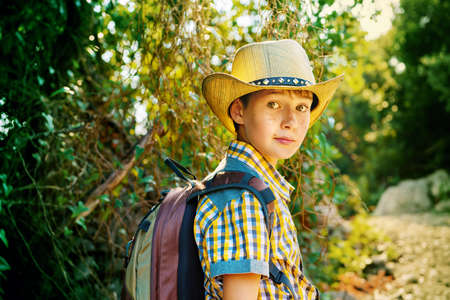 Happy boy on summer holidays. Outdoor activities, tourism and adventure.の写真素材