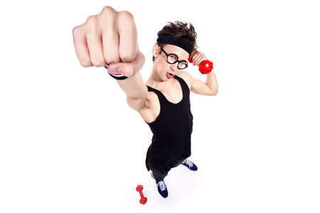 Funny thin man doing exercises with dumbbells. Bodybuilding, muscle building. Sports, activities...