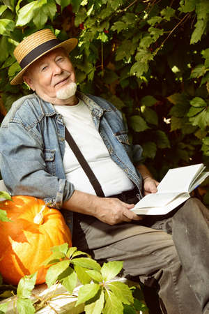Portrait of a handsome senior man having a rest on a sunny summer day. Healthcare, resort. Happy retirement.の写真素材