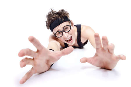 Funny thin man pushing from the floor. Bodybuilding, muscle building. Sports, activities concept. Isolated over white.の写真素材