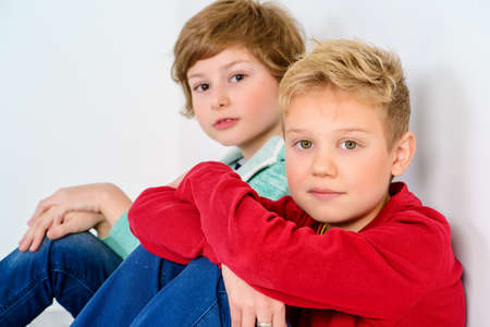 Happy joyful children having fun together. Children's fashion. Education. Happiness, activity and child concept.の写真素材