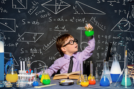 Little boy scientist in the laboratory.