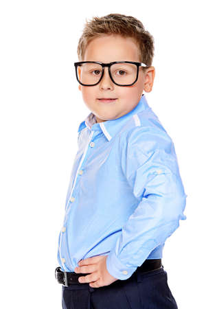 Portrait of a big confident smart boy wearing classic shirt and glasses.の写真素材