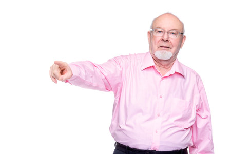 Positive old man showing at something. Healthcare. Retirement. Copy space. Isolated over white.