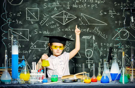 Cute little girl scientist making experiments in the laboratory.の写真素材