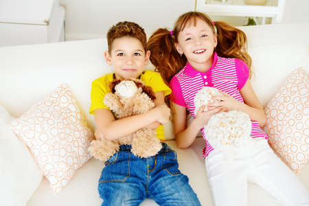 Portrait of happy joyful children at home. Family concept.の写真素材