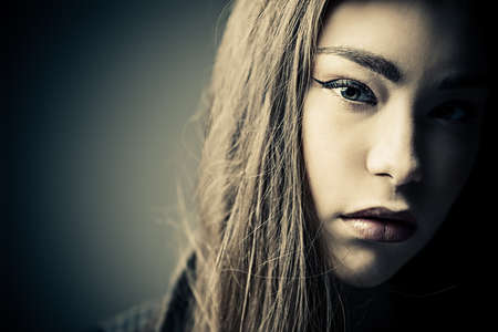 Beauty concept. Young woman with long straight hair. Hairstyle, healthy hair. Cosmetics and make-up.の写真素材