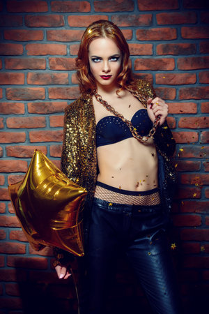 Glamorous sexy girl at a night party. Beauty, fashion. Luxury.の写真素材