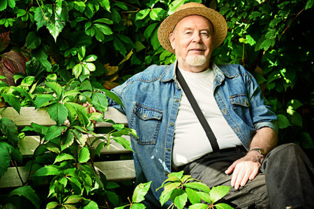 Portrait of a handsome senior man having a rest on a sunny summer day. Healthcare, resort. Happy...