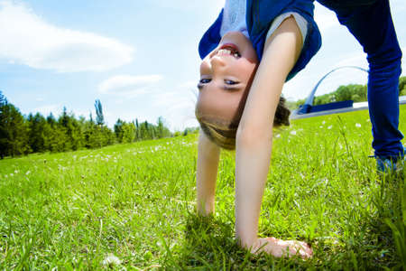 Happy girl enjoys her summer holidays.の写真素材