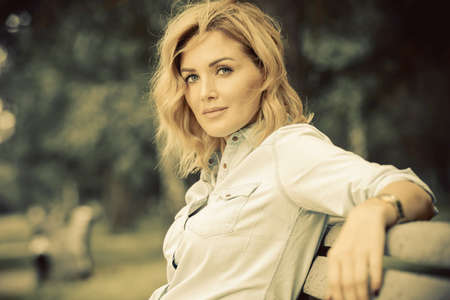 Happy middle aged woman on a summer day. Mood of summer and carefree vacations. Beauty, cosmetics.の写真素材