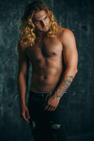 Portrait of a strong healthy handsome athletic man. Male beauty concept. Fitness, bodybuilding.?の写真素材