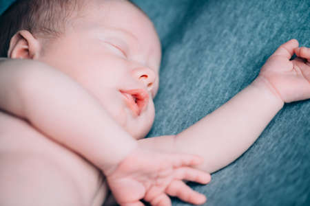 Portrait of a lovely sleeping newborn baby. Baby care, Healthcare.の写真素材