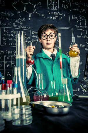 Smart?boy scientist making chemical experiments in the laboratory. Educational concept. Discovery.の写真素材