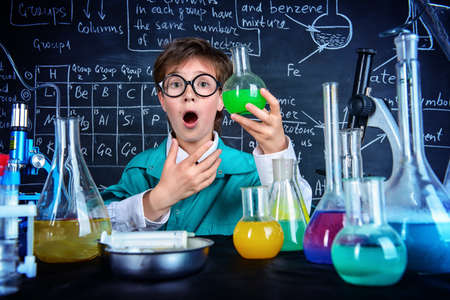 Smart?boy scientist making chemical experiments in the laboratory. Educational concept. Discovery.の写真素材