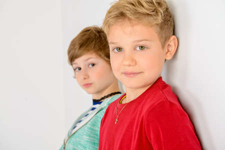 Happy joyful children having fun together. Children's fashion. Education. Happiness, activity and child concept.の写真素材