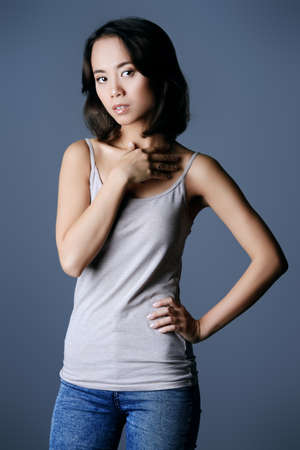 Portrait of a pretty asian woman in casual clothes. Asian beauty. Studio shot.の写真素材