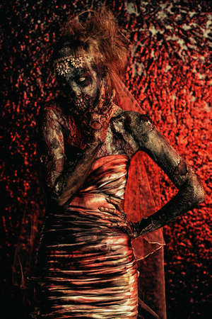 Portrait of a bloody dead bride woman. Zombie bride. Halloween. Horror.の写真素材