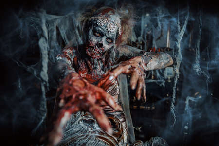 Portrait of a bloody dead bride woman. Zombie bride. Halloween. Horror.の写真素材