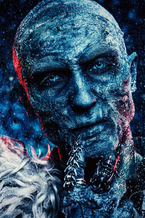 Close-up portrait of a zombie man covered with snow. Halloween. Horror film.の写真素材