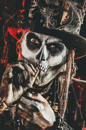 Baron Saturday. Baron Samedi. A man with a skull makeup dressed in a tail-coat and a top-hat. Dia de los muertos. Day of The Dead. Halloween.の写真素材