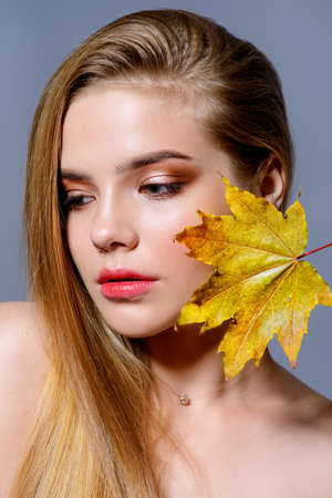 Beauty skin and hair concept. Portrait of a beautiful young woman with healthy shiny skin and hair.の写真素材