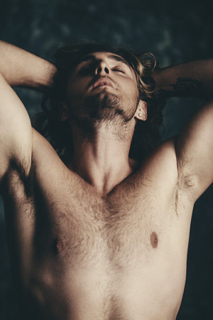 Portrait of a strong healthy handsome athletic man. Male beauty concept. Fitness, bodybuilding. 
