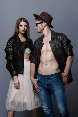 Sexy fashionable couple dressed in stylish clothes.の写真素材