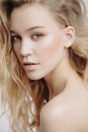 Portrait of a beautiful blonde woman with natural make-up.の写真素材