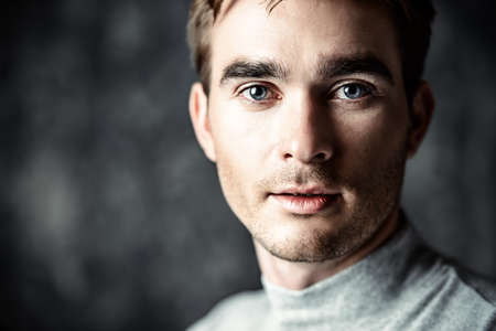 Close-up portrait of a crying man.の写真素材