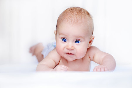 Portrait of a sweet three-month-old baby. baby care, Healthcare.の写真素材