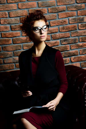 Portrait of a contemporary business woman with notebook.の写真素材