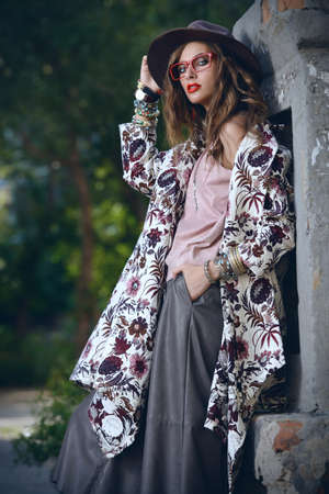 Beautiful sexy fashion woman posing outdoor. Fashionable clothes. の写真素材