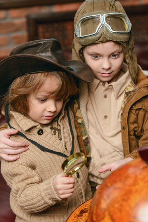 Two boys are playing at home to travelers. Childhood. Fantasy, imagination. 