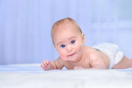 Portrait of a sweet three-month-old baby. Baby care, Healthcare.の写真素材