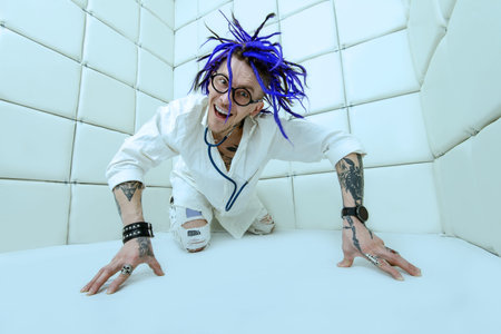 Portrait of a cheerful crazy doctor in a psychiatric hospital.