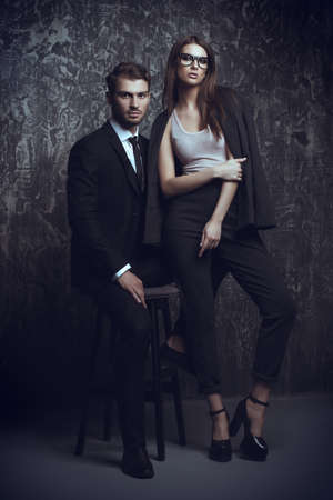Beautiful gorgeous couple in elegant evening dresses. Fashion, glamour.の写真素材