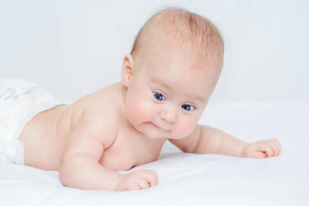 Portrait of a sweet three-month-old baby. Baby care, Healthcare.の写真素材