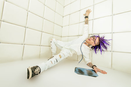 Portrait of a cheerful crazy doctor in a psychiatric hospital.
