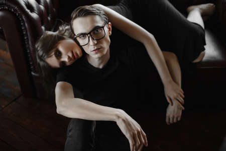 Portrait of an attractive young people in love at home. Beauty, fashion.の写真素材