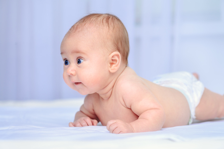 Portrait of a sweet three-month-old baby. Baby care, Healthcare.の写真素材