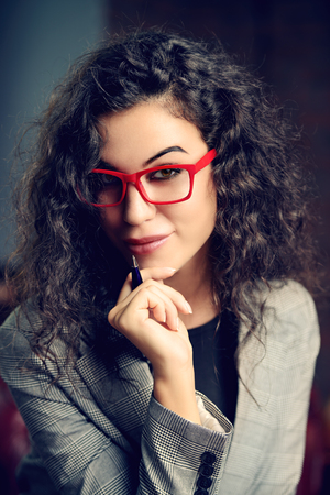 Portrait of a beautiful businesswoman at the office.の写真素材