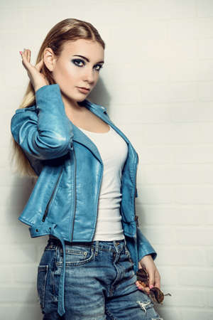 Portrait of a beautiful girl in casual clothes. Beauty, fashion concept. Studio shot.の写真素材