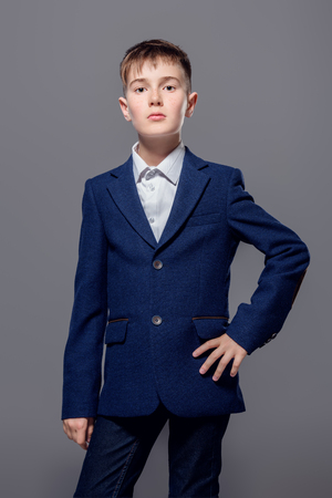 Children's fashion. Portrait of a boy in an elegant jacket.の写真素材