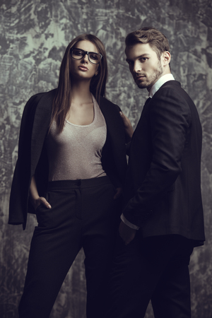 Beautiful gorgeous couple in elegant evening dresses. Fashion, glamour.の写真素材