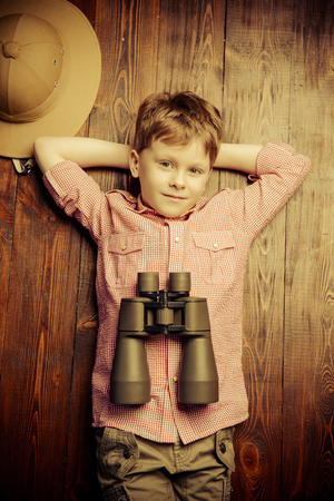 Child boy playing at home in traveler. Childhood. Fantasy, imagination.の写真素材